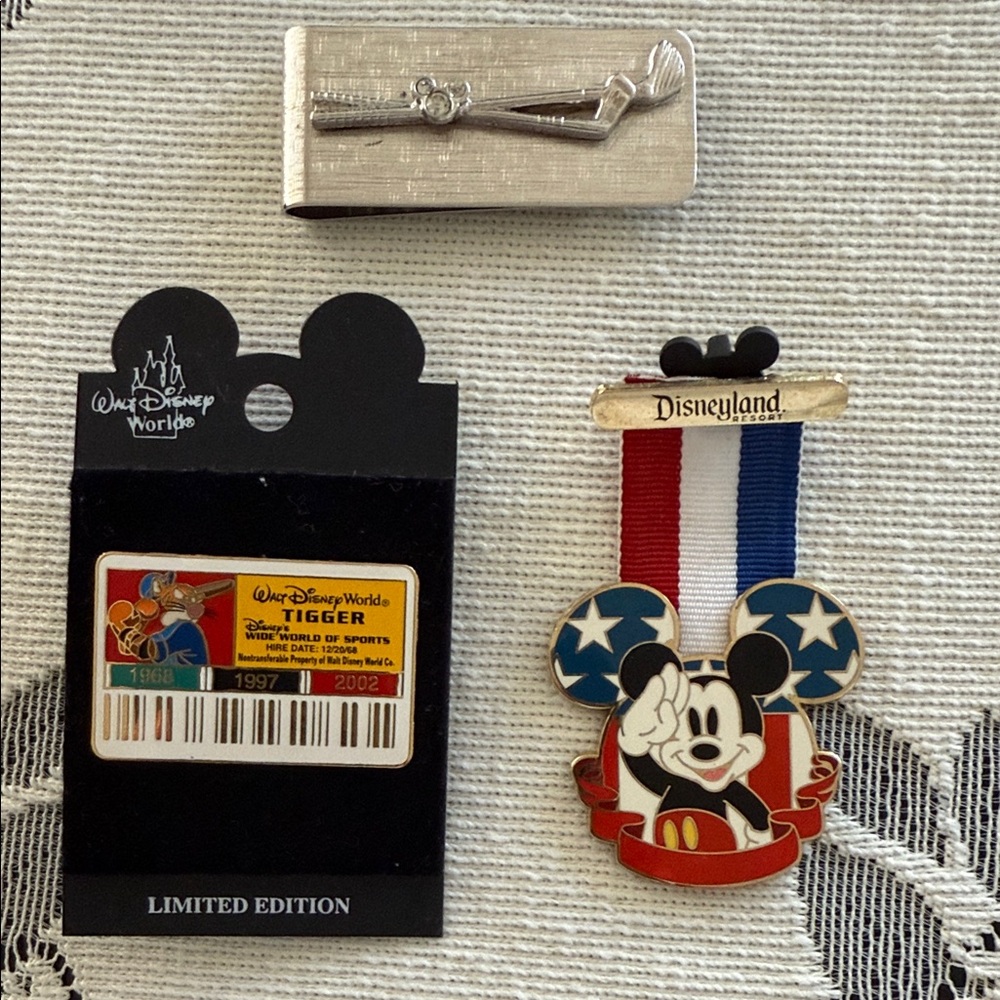 Disneyland Mickey Pin, Tigger Wide World of Sports Pin, and Mickey Money Clip